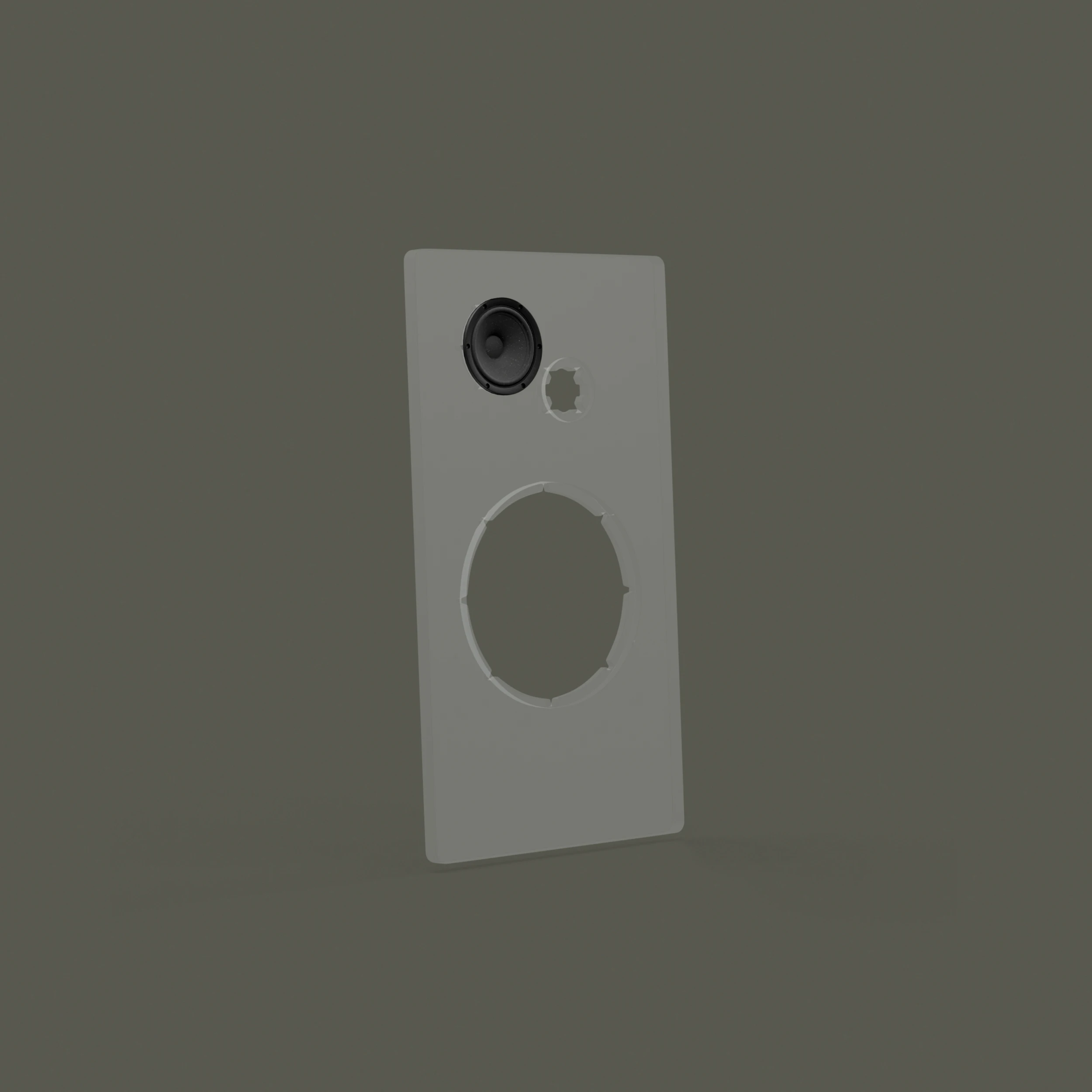 Partial view of a gray speaker panel with one fully mounted speaker and two empty circular slots against a plain background.