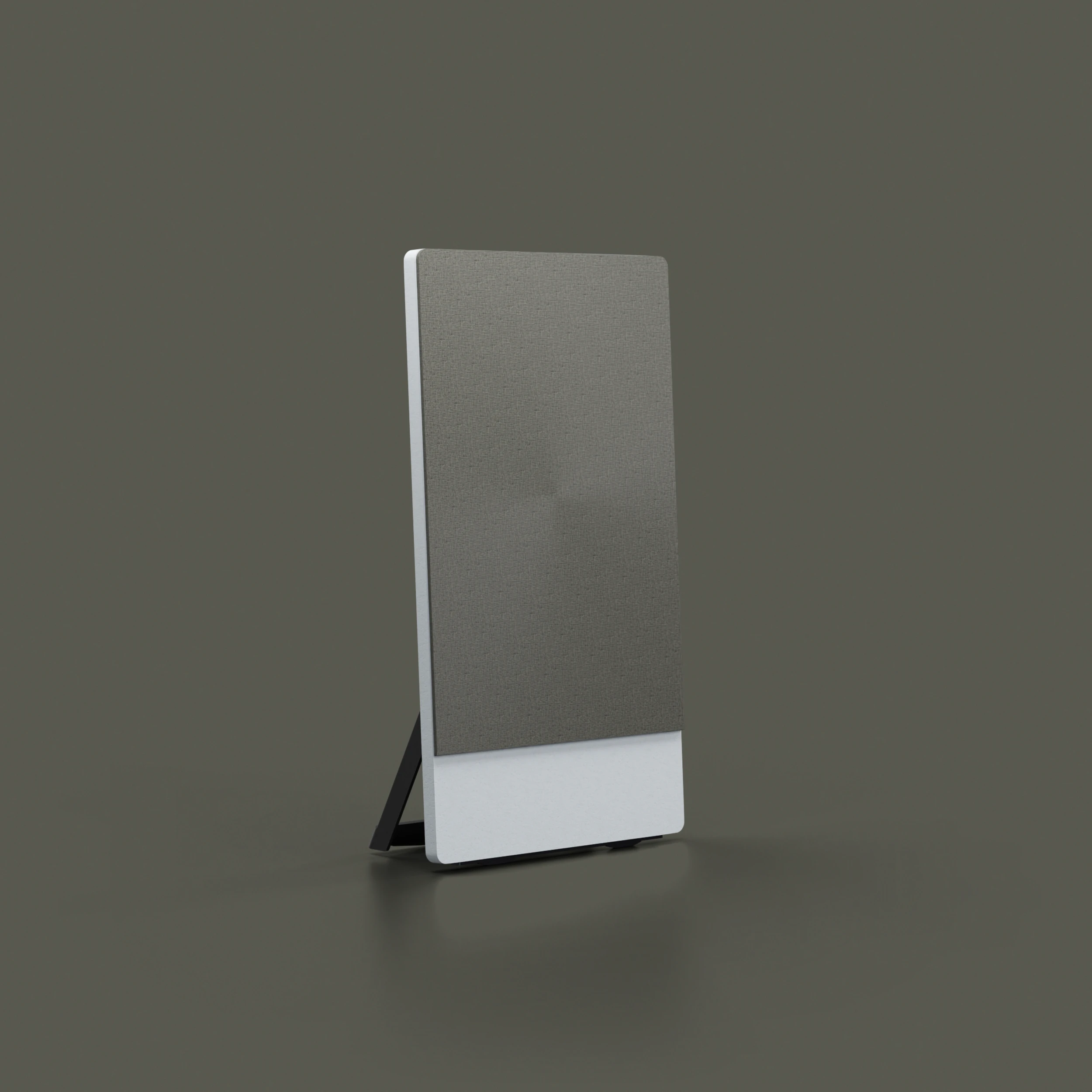 Modern rectangular speaker with grey fabric front and white base on a dark surface.