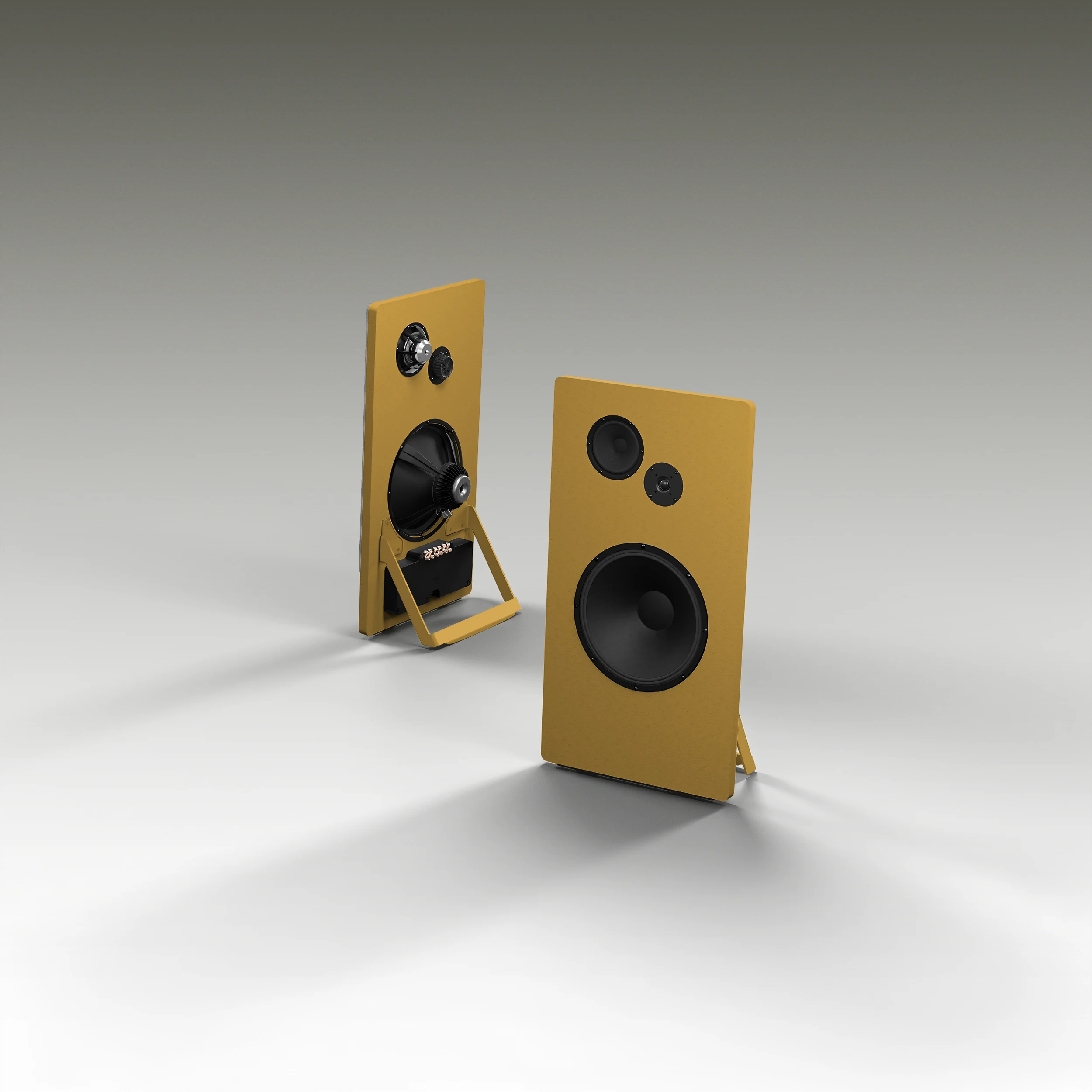Two ochre-colored rectangular speakers with black drivers, one facing forward and one angled showing its back with components.