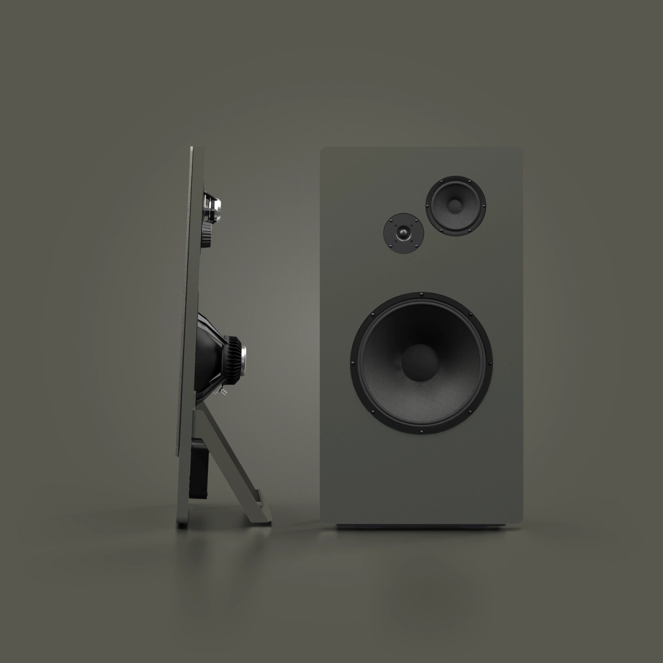 Two gray speakers, one showing the front with three speaker drivers and the other showing the side profile with visible speaker components.
